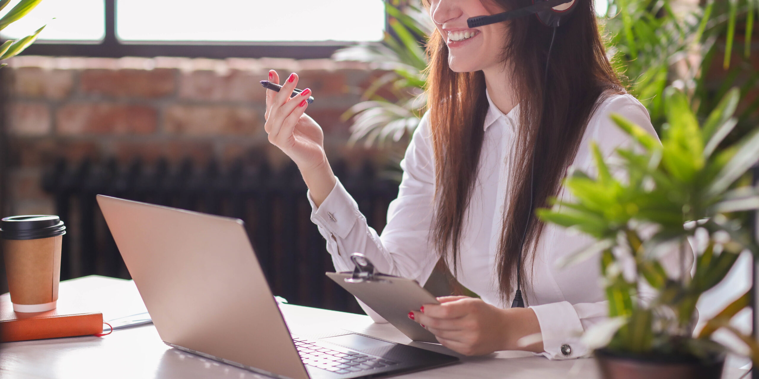 Woman working in call center as dispatcher